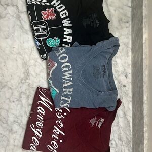 3 gently used Harry Potter Hogwarts t-shirts (large/xl)